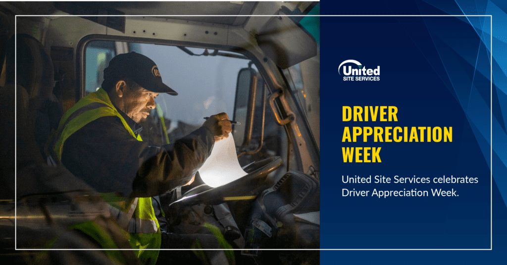 Truck driver reviewing paperwork early morning